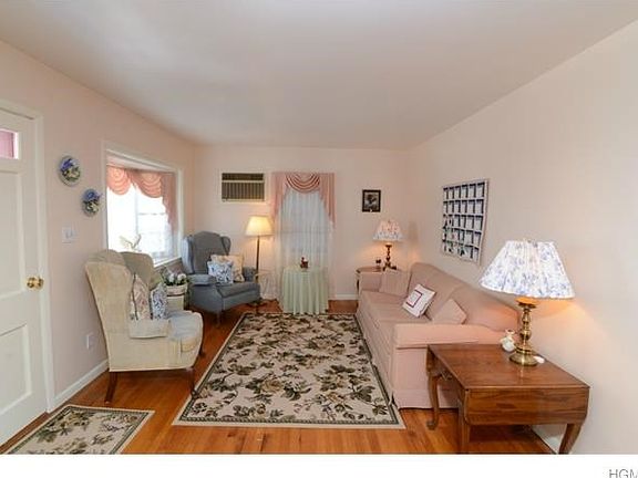 Front door view Living room, hardwood floors