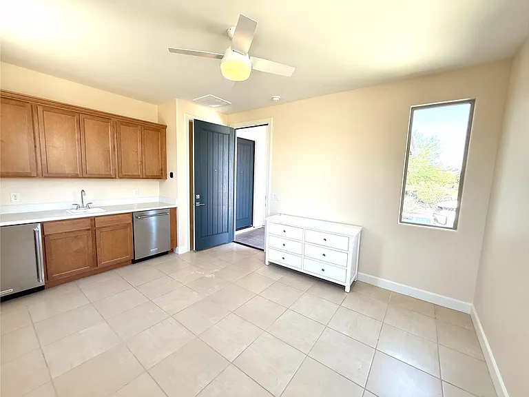 Front room attached casita with separate entrance. Versatility if adjacent bathroom and secondary room to be enclosed or open to the rest of the home.