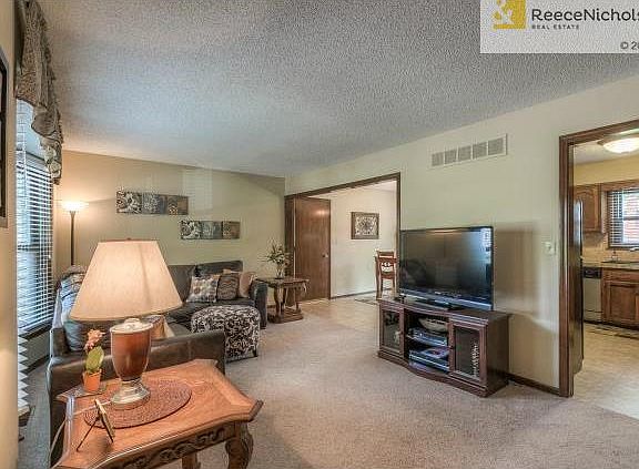 Open floor plan makes entertaining a breeze with kitchen and bre