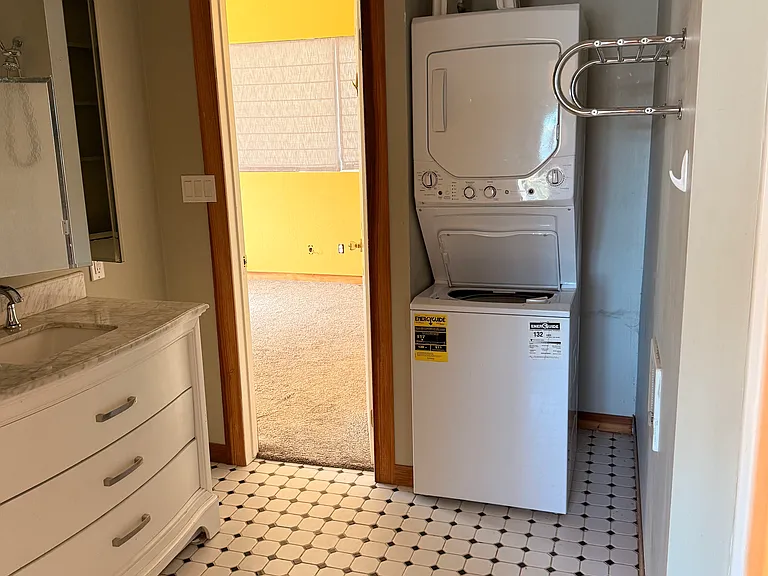 Bathroom with washer and dryer