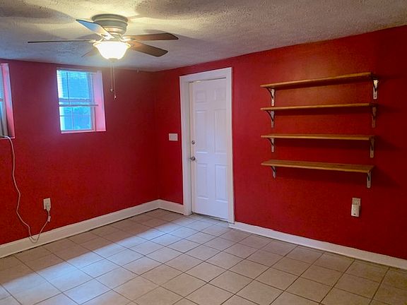 Bedroom unfurnished (note the walls are now a light grey)