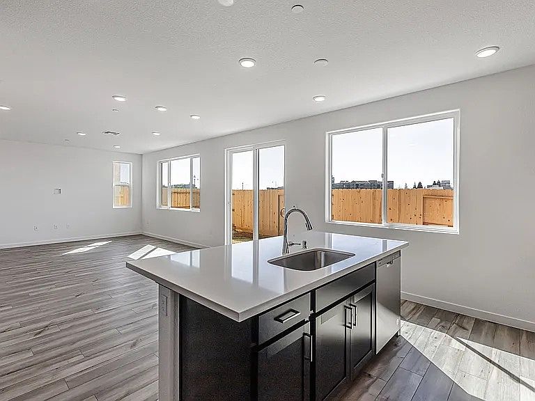 Kitchen Island and Living Room.