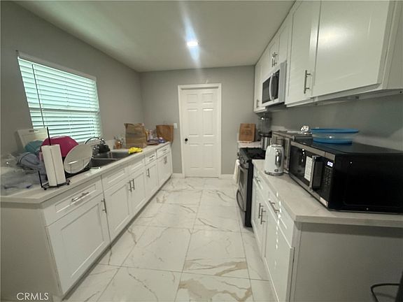 5th image of 9063 Olive St