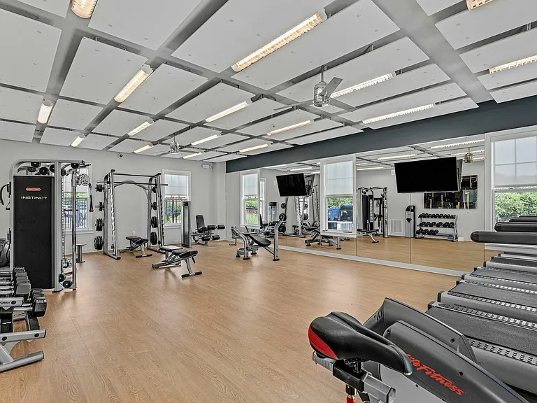 Stay active with access to a modern fitness center featuring cardio equipment and free weights at The Flatts Starkville