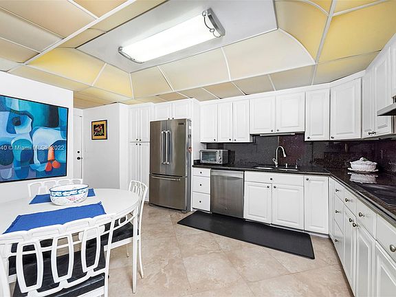 4th image of 9240 W Bay Harbor Dr APT 4B