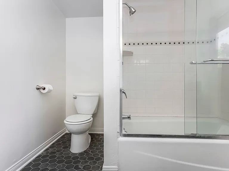 Lower level bathroom with custom glass.