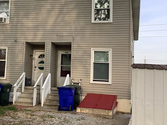 Rear of duplex with ample off street parking area