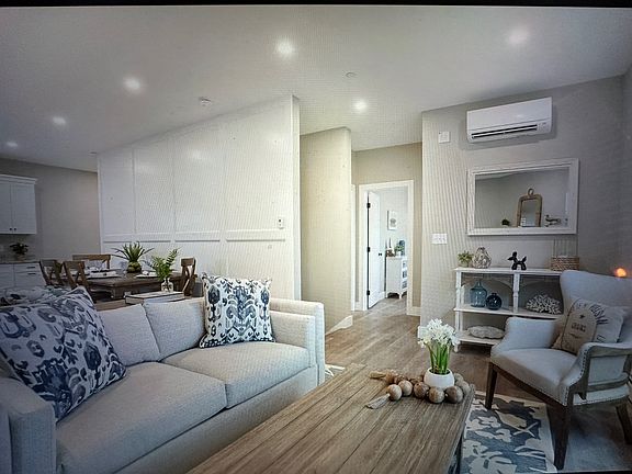 Staged Unit -
Not 104, but same layout for your overall sense of the unit.