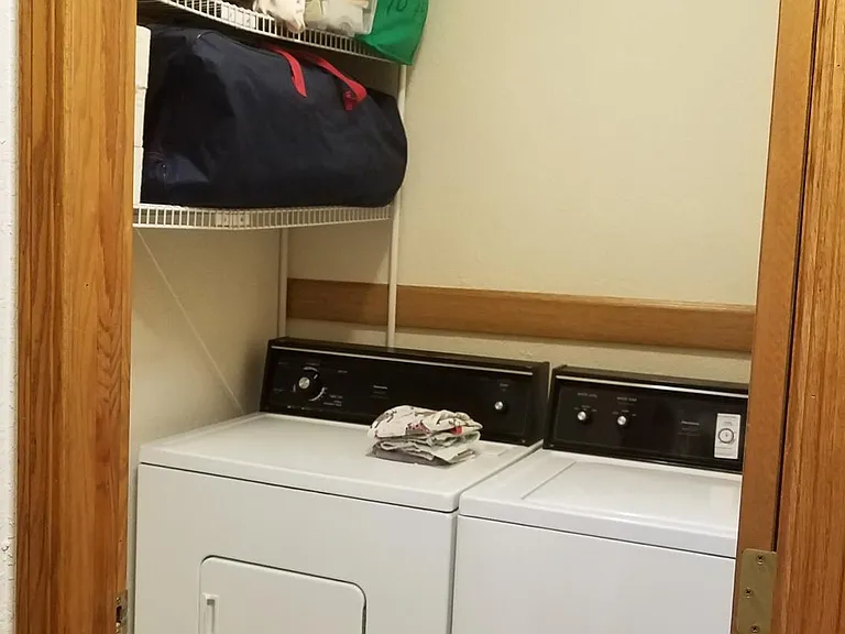 Laundry room with washer and dryer included
