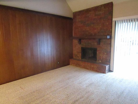 Living Room with Wood Burning Fireplace