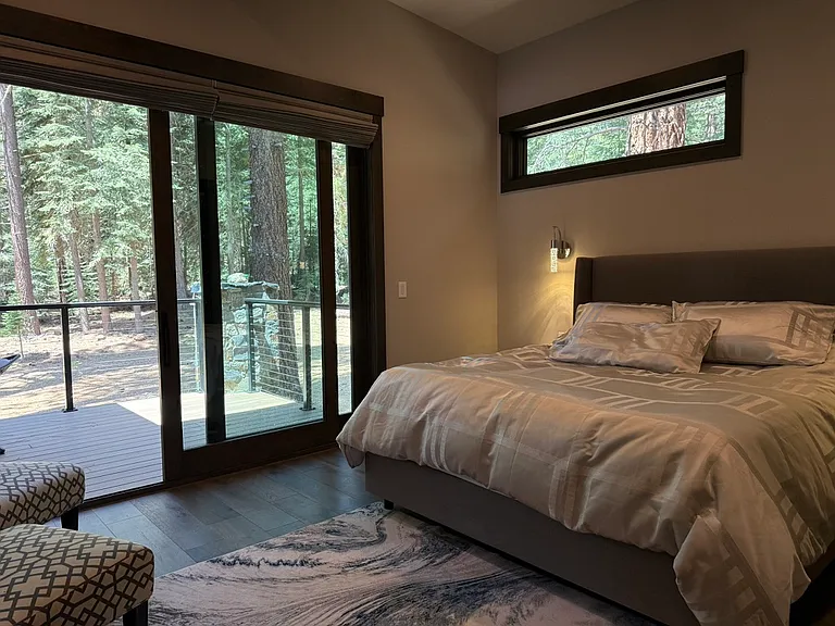 Master Suite, King Bed with seating area and direct access to the expansive deck