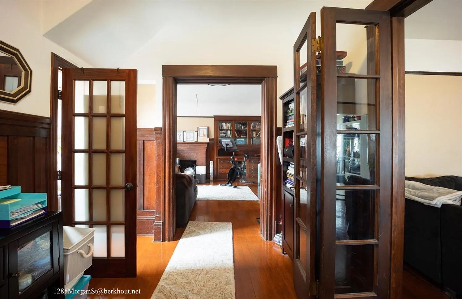 Entryway looking in to unit. Bathroom to left, bedroom straight ahead, LR & kitchen to the right.