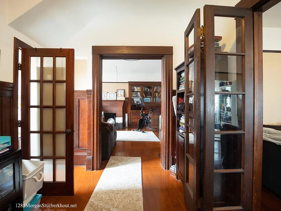Entryway looking in to unit. Bathroom to left, bedroom straight ahead, LR & kitchen to the right.