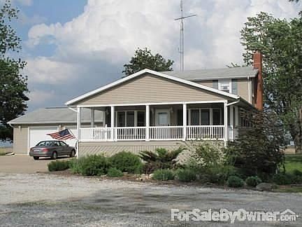 Front porch and attached garage
						:
						Watch the glowing, evening sunsets from this 12 x 24 foot covered porch.