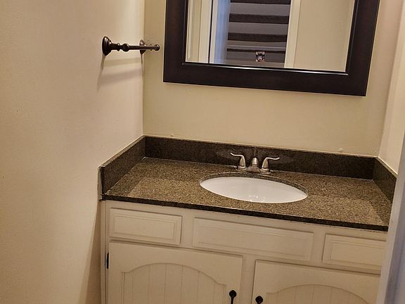 Half bathroom just off living room on main level