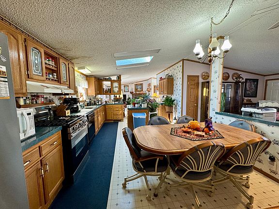 3rd image of 9857 Konakada Ln NW