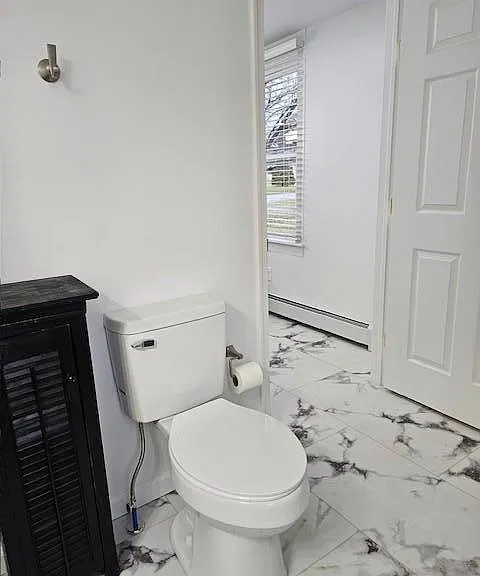 LAUNDRY AND 3/4 BATHROOM OFF THE KITCHEN ON THE 1ST FLOOR