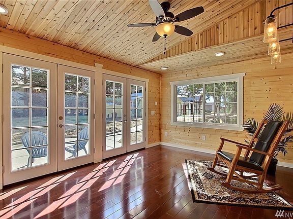 Stunning heated studio with natural shiplap finish work, vaulted ceiling and hardwood floor. A perfect home office (wired for DS