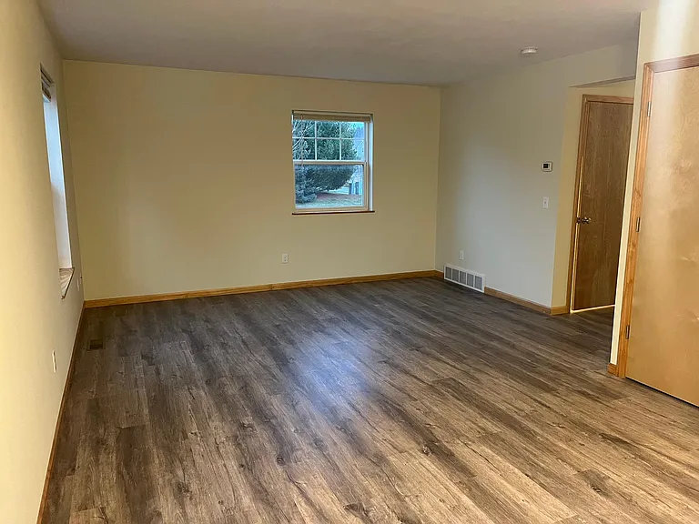 Main living space adjacent to kitchen.