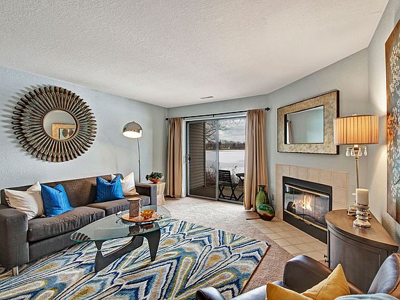 River's Cove living room with fireplace