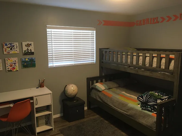 Two bedrooms at the opposite end of the house from master bedroom.