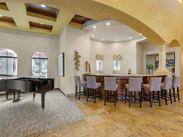 Our clubhouse features a bar area with piano ambiance