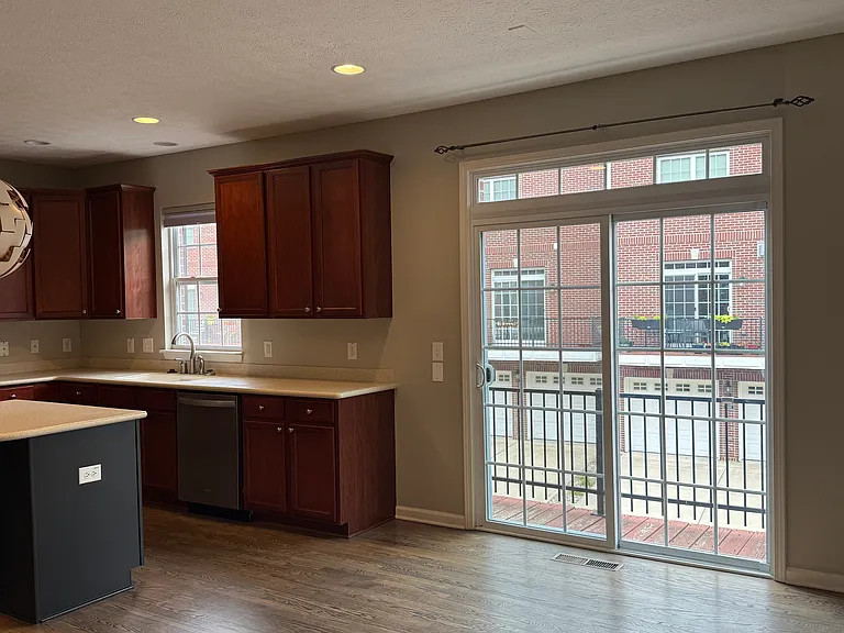 The kitchen is open plan onto the dining room which has a sliding door out onto a second deck.