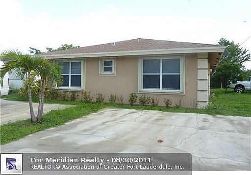 1st image of 176 SW 2nd Ct