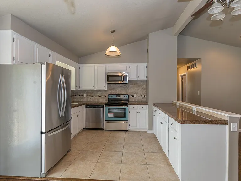 7001 NW Coronado St — Photo 4
