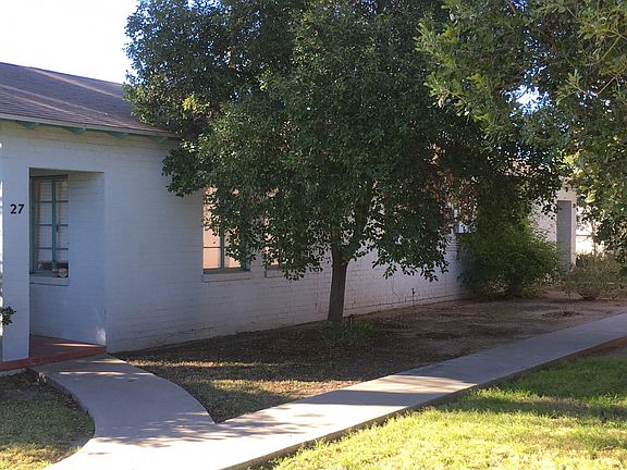 Walkway along duplex to the rear unit.