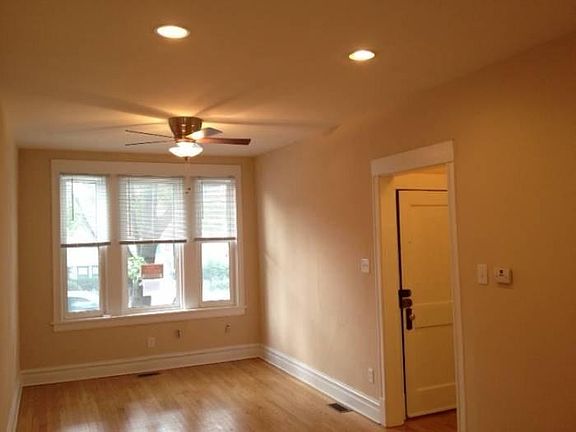 WEST SUN EXPOSURE LIVING ROOM, REFINISHED HARDWOOD FLOORS