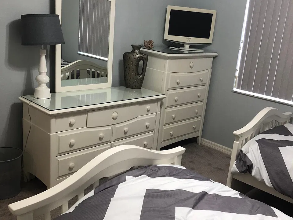 2nd bedroom with 2 twin beds and a trundle bed