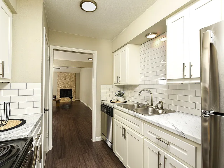 2/2 Upgraded Kitchen looking into Living Area