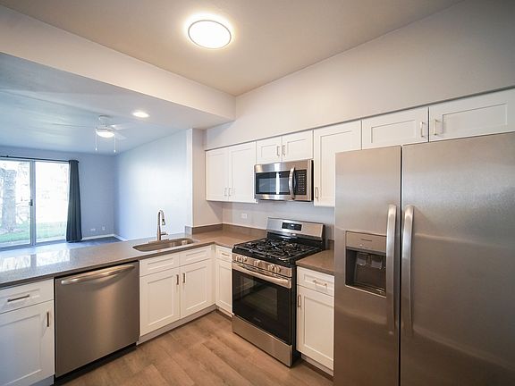 Kitchen with new cabinets, quartz countertops, and new appliances