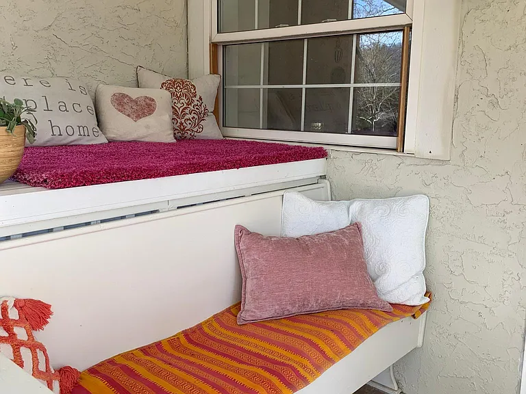 Exterior bench off back door off of kitchen.