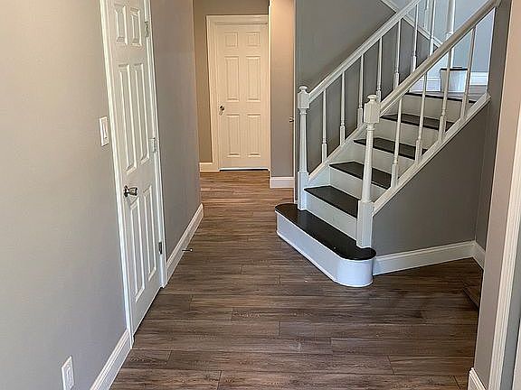 Foyer with angled stairs