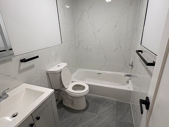5th image of 68-10 Woodside Ave #1
