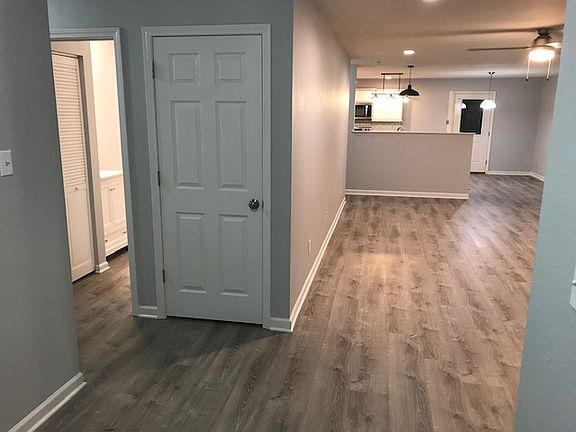 Door to basement and bath