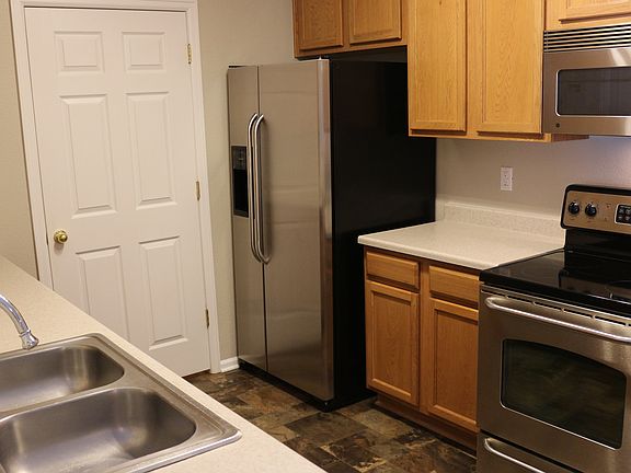 Fully equipped kitchen with stainless appliances