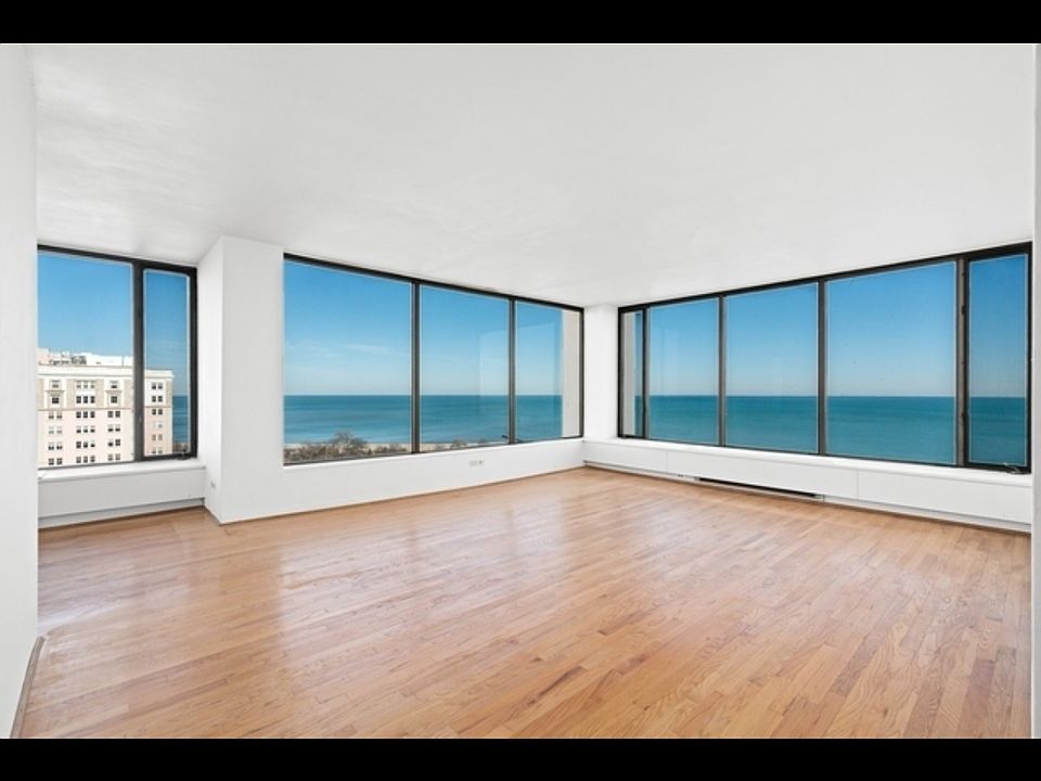 Living room- stunning Lake Michigan views