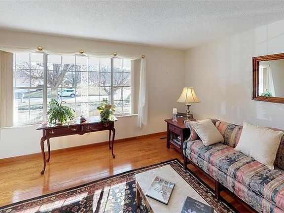 Living room-another view showing large window and natural light