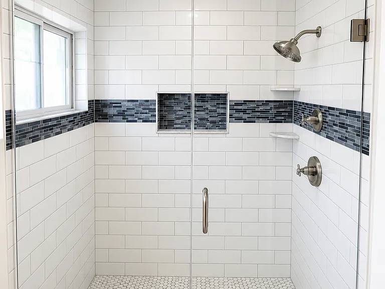 Dual valve shower in Primary Bathroom with custom glass enclosure