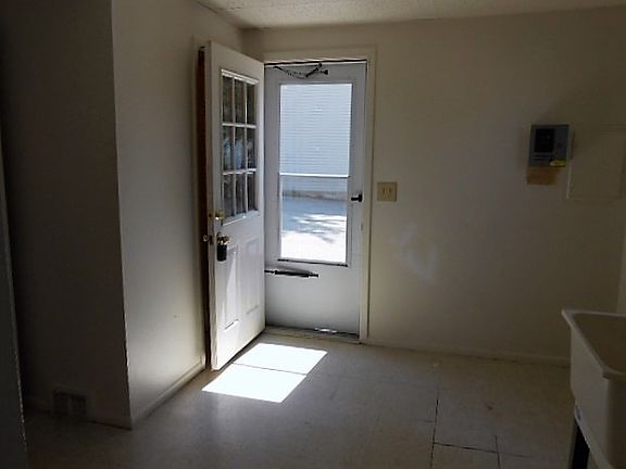 SIDE ENTRANCE/LAUNDRY