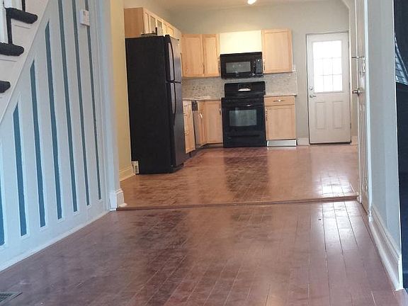 Large open floor concept leading from living room into dinin