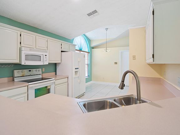 4th image of 1548 Woodfield Oaks Dr