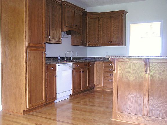 Kitchen wood floors, wood cabnets, Dish washer, Stove/stove top, Microwave 