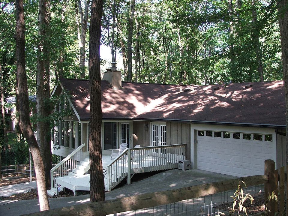 Double car garage and one of three large decks for entertaining