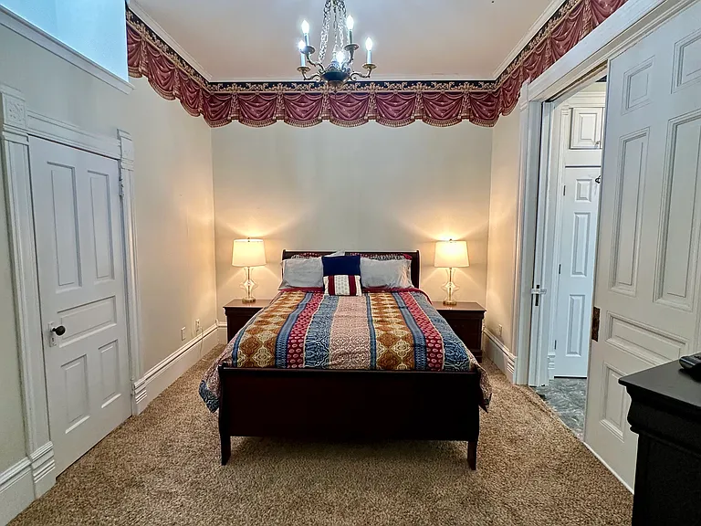 Primary bedroom with skylight and two closets