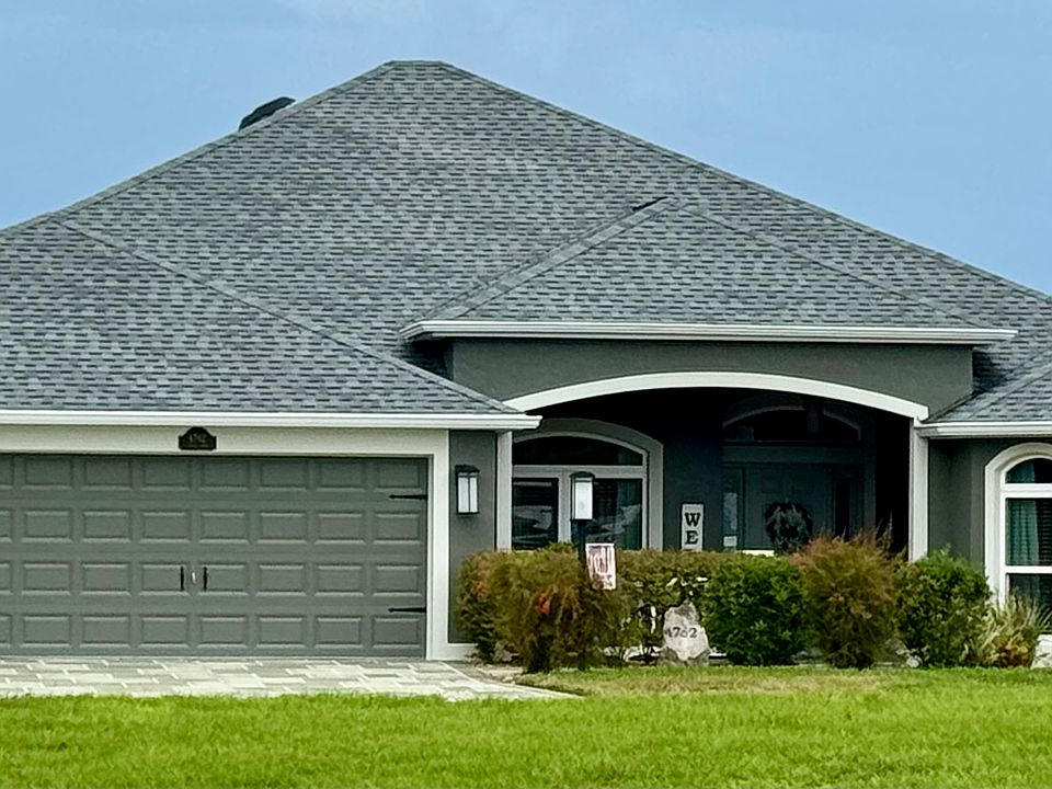 View from the road of this gorgeous home and pool!