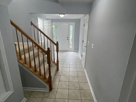 Foyer steps to Family room
